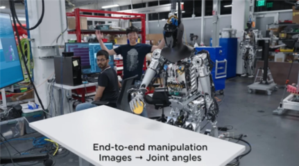 人形機器人亮相特斯拉門店 從擎天柱看智能機器人研發新浪潮